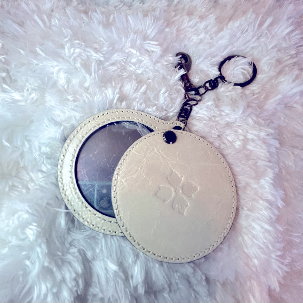 Patricia Nash Liscia mirror cream off white ivory latte key fob chain bag charm